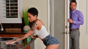 Brunette Honey Gold sensual kissing on the couch