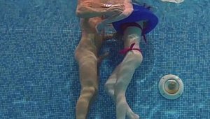 Relaxxxed: Bianka Brill bends over in the pool